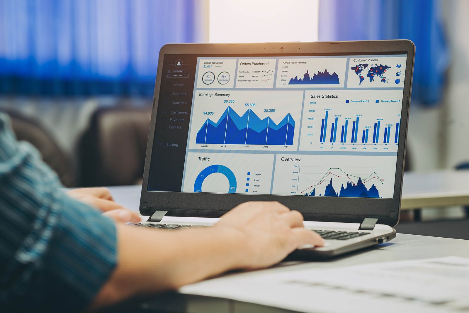 person-analyzing-data-charts-on-a-laptop-screen-2026-01-06-09-28-11-utc
